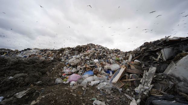 Large landfill near the metropolis in autumn