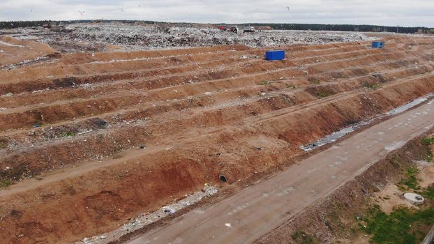 Large landfill near the metropolis. View from the drone