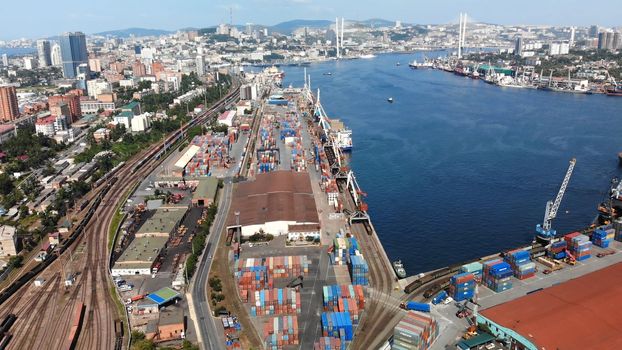 Top view. Vladivostok Commercial Sea Port. Industrial port with containers in Vladivostok