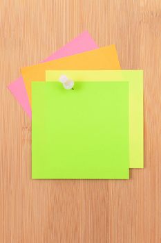 Colored Sticky Notes with Copyspace Pinned to the Wooden Message Board. To Do List Reminder in Office. Blank Memo Sticker at Work - Template. Empty Checklist - Mockup