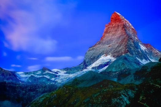 Matterhorn above zermatt pine trees woodland idyllic valley, Swiss Alps