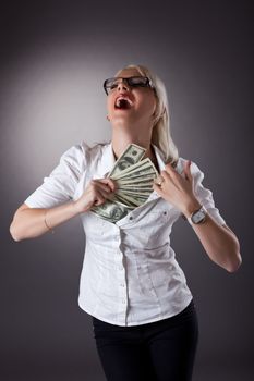 sexy blond businesswoman hide money under shirt