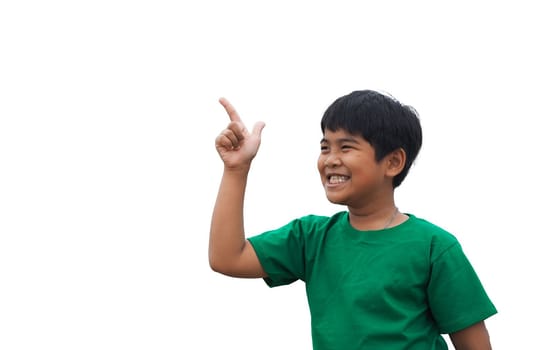 The boy smiled and pointed his hand to his side. on a white background