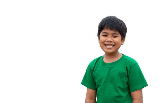 The boy wore a green shirt and stood smiling. on a white background