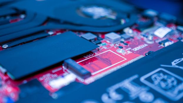 Circuit board with resistors microchips and electronic components. Computer hardware technology. Integrated communication processor. Information engineering. PCB.