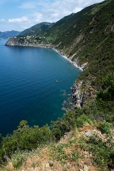 View of a section of the coast with one of the picturesque places in the Italian region of Cinque Terre.