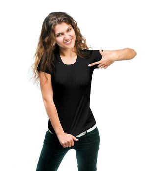 Young beautiful girl posing with blank black shirts. Ready for your design