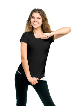 Young beautiful girl posing with blank black t-shirts. Ready for your design