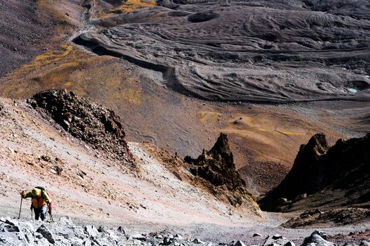 Tourists trekking on Erciac volcano in Turkey, view from top