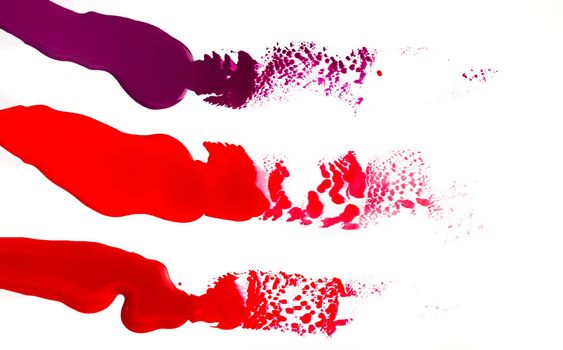 Bright spills of paint isolated on white background