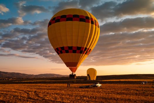 Hot air balloon festival ending at sunrise in Cappadocia, Turkey
