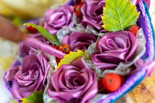 A beautiful bouquet of flowers made of purple fabric