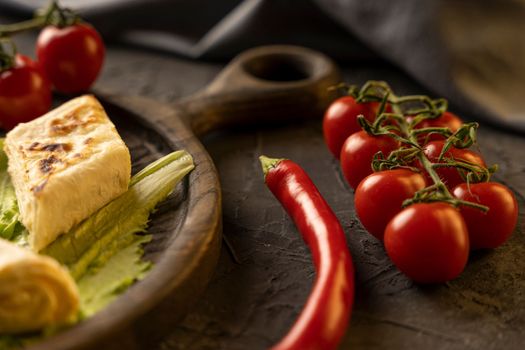Delicious fried pita bread roll with cottage cheese and herbs. Fried puff rolls of thin Armenian lavash stuffed with cottage cheese. Wrapped tortillas. Traditional cuisine. Delicious and healthy food.