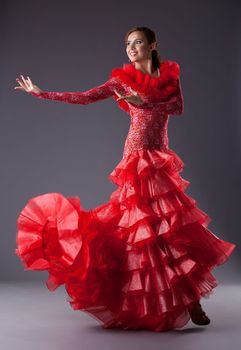 one woman gipsy flamenco dancer in studio