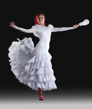 Beautiful Young dancer show white oriental flamenco costume