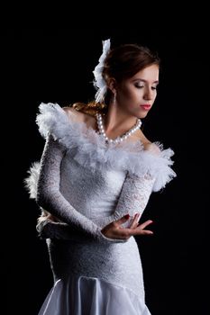 Young woman dance in white oriental flamenco costume