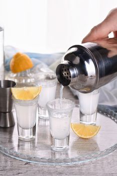 Freshly squeezed lemon juice paired with vodka offers a sophisticated twist on the drink. Serve in shots with salt.