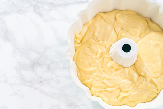 Cake batter in bundt cake pan ready for baking.