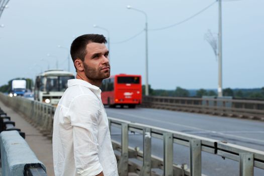 tired sad man portrait look at street outdoor