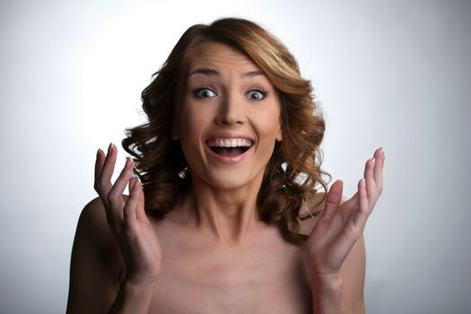 Beauty young woman point finger and smile about smart idea
