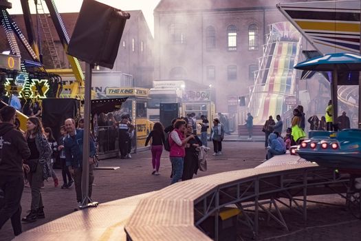 Rovigo, Italy 25 October 2022: People at the funfair scene