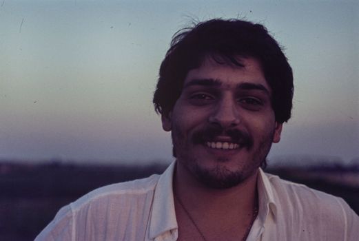 Rovigo, Italy october 1976: Man with mustache close up portrait in 70s