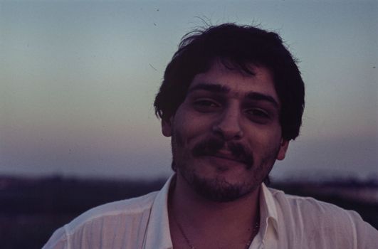 Rovigo, Italy october 1976: Man with mustache close up portrait in 70s