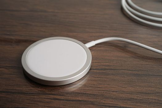 Wireless charger, magnetic charging modern equipment of mobile phone.