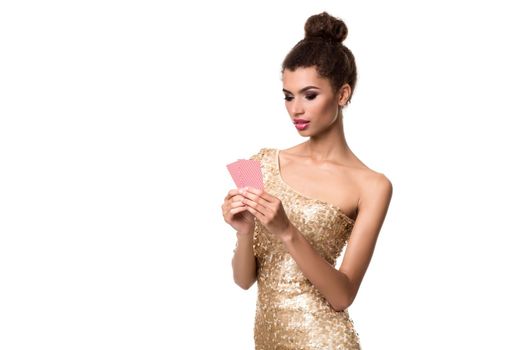 Pretty african girl shows two cards in casino poker and win Young woman in studio on white background