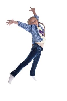 Full length portrait of happy girl in jeans. Isolated on white