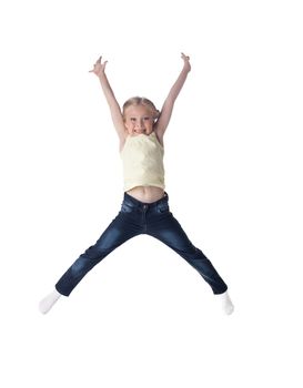 Full length portrait of happy girl in jeans. Isolated on white