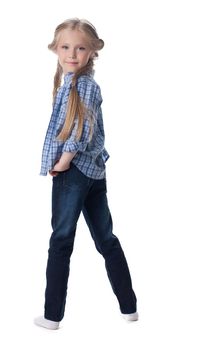 Full length portrait of beautiful girl in jeans. Isolated on white