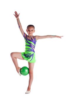 young gymnast stand with green ball isolated