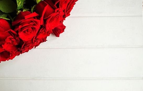 red rose on a wooden background. Valentine's Day gift.selective focus.holiday