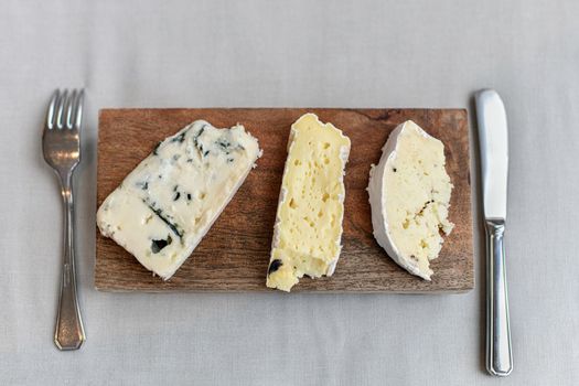 French cheese on a wooden board