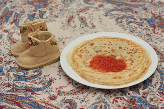 Pancakes with red caviar. Shrovetide