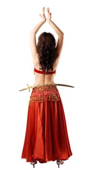Woman in arabic red costume with saber at hip