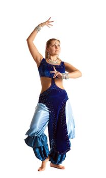 Young woman posing in arabia dance - traditional blue costume