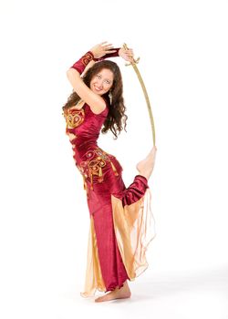 young womand in indian dress dance with sword