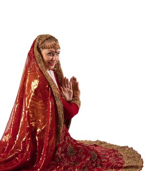 Beauty woman in red oriental indian costume isolated