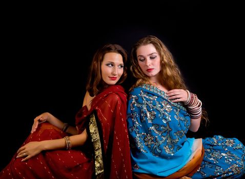 two young and beauty girl - indian costume - relax scene