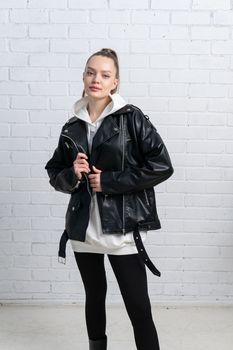 attractive caucasian jacket beauty beautiful model black leather clothes portrait white female style