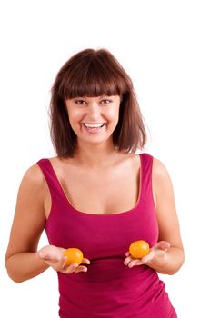 Young woman with gorgeous breast and small tangerine