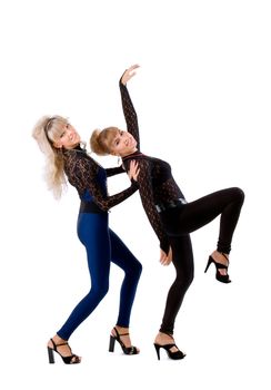 two pretty girl dance together on white background