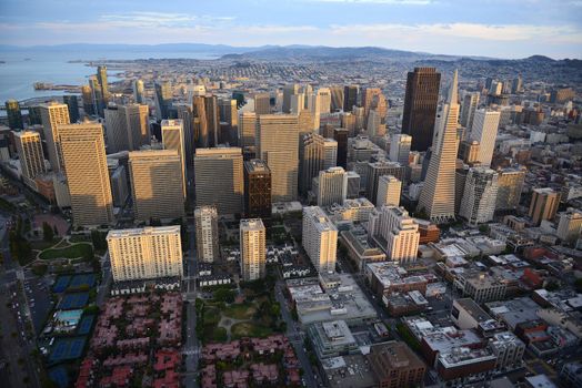 an aerial view of downtown san francisco during sunset