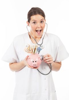 happy woman doctor with piggy bank full of money