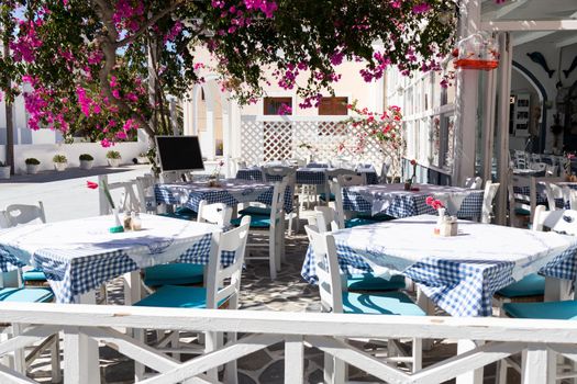 restaurant terrace in front of the beach in kamari on the island of santorini