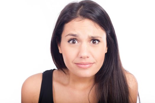 Close up portrait of pretty surprised woman  on white background