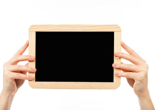 woman's hands holding a blackboard publicity