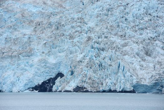 blue color of tidewater glacier in prince william sound in alaska